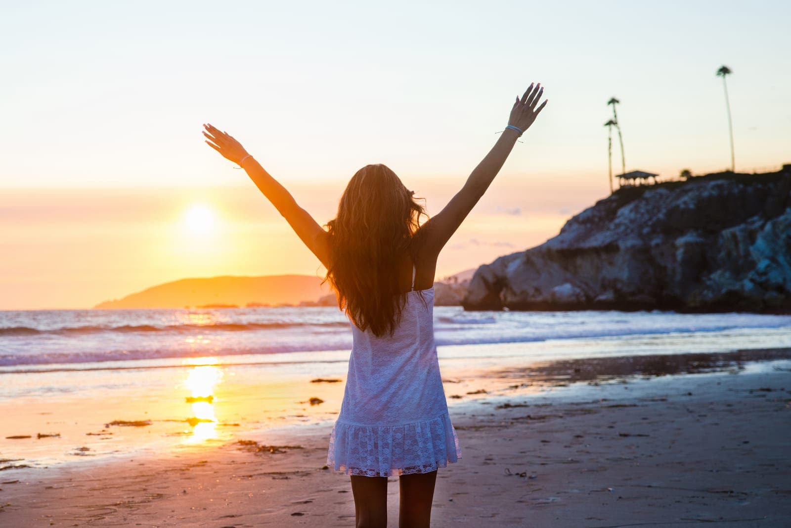 High school senior portrait on the beach at sunset on the Central Coast